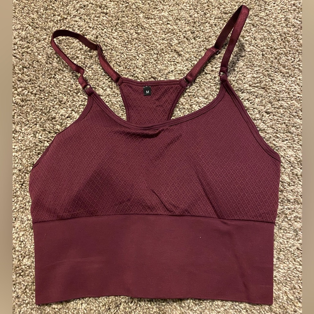 Balance Athletica crop top bra color is more Maroon than red like wine color